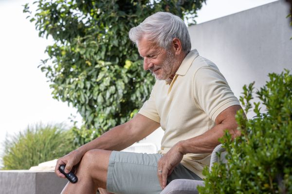 The BiteX Max is applied outdoors to a lower leg.